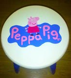 Peppa Pig Handpainted Stool. Painted in Annie Sloan Old White chalk paint and habitat paint for the logo. Finished with a matt varnish which protects the paint from grubby little fingers and gives a soft sheen wipeable finish.
