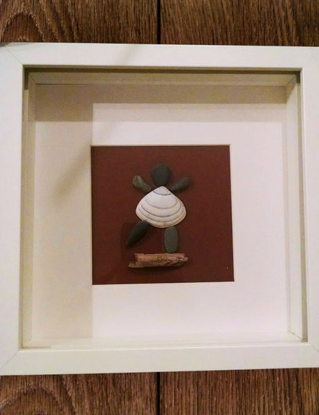 Pebble Art - Girl. Made using shells from Irish Beaches & driftwood collected along the way, these unique pictures have a beautiful natural feel & cast some amazing shadows in the right light. 