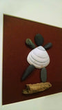 Pebble Art - Girl. Made using shells from Irish Beaches & driftwood collected along the way, these unique pictures have a beautiful natural feel & cast some amazing shadows in the right light.