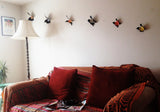 Vinyl Butterfly Wall Art. Some funky upcycled vinyl record wall art. These colourful butterflies cast some amazing shadows on the wall in the right light!